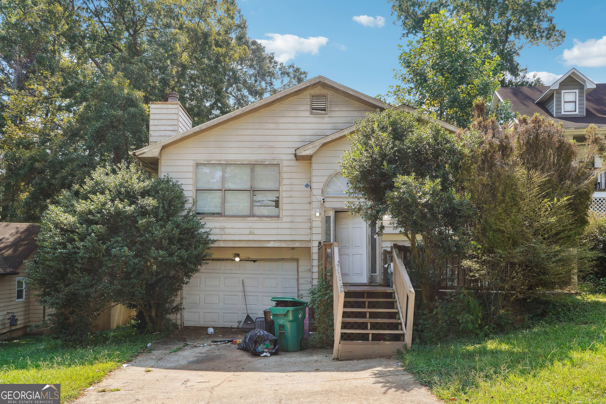Welcome to your next opportunity! This 3 bedroom, 2 bath home with a 2 car garage is being sold AS-IS and is ready for a the TLC it needs from its new owner. Whether you're searching for your first starter home or looking to secure the perfect investment property, this home is full of potential. Situated in Lithonia, you'll enjoy easy access to local shopping, dining, schools, and major highways. Plus, with only a 30 - 35 minute commute to Hartsfield-Jackson Atlanta International Airport, this location makes travel convenient. Bring your vision and make this property your own. The possibilities are endless! Don't miss out on a home that can grow with you, build equity, or serve as a smart addition to your portfolio.
