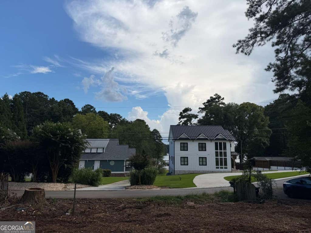 Photo of 156 Little Victoria Road, Woodstock, GA 30189 (MLS # 10821779)