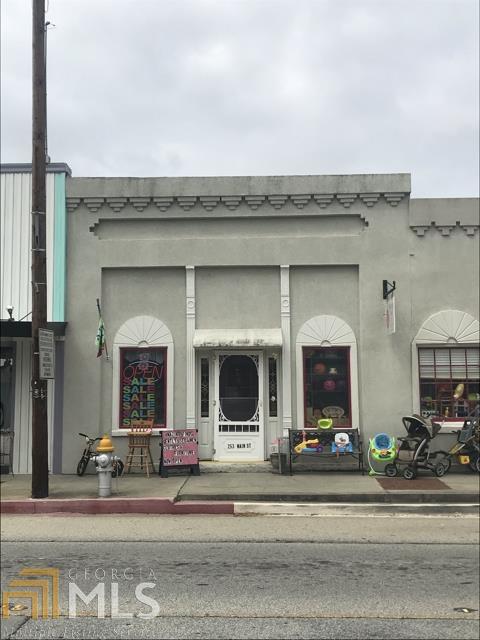 Great space with easy access and high visibility. Right in downtown Loganville on Main Street next to the Town Green. Two entrances - one on Main Street and one in the back. Plenty of parking behind building. Can be used as a store front, office, church or school. Adjacent building also available if additional square footage is needed for $13.45/sq ft (2663 total) Owner is willing to entertain offers to sell. Buildings can be also be leased individually for $13.95/sq ft (251 Main Street is 1089 sq. ft. and 253 Main Street is 1574 sq. ft.)