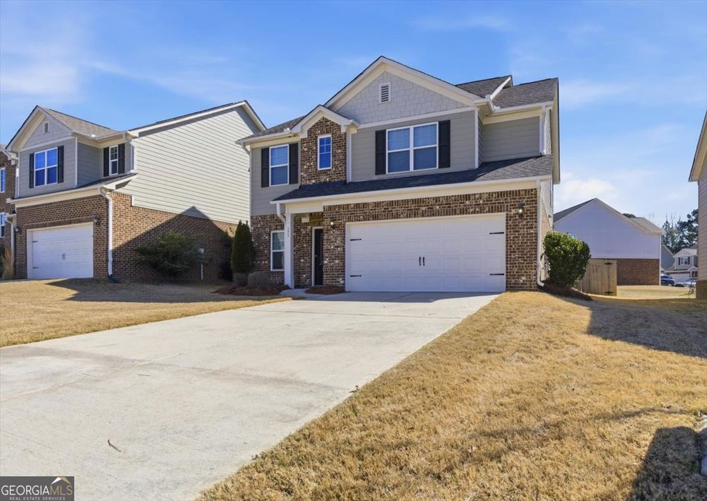 Photo of 171 Al Jennah Boulevard, Locust Grove, GA 30248 (MLS # 10696791)