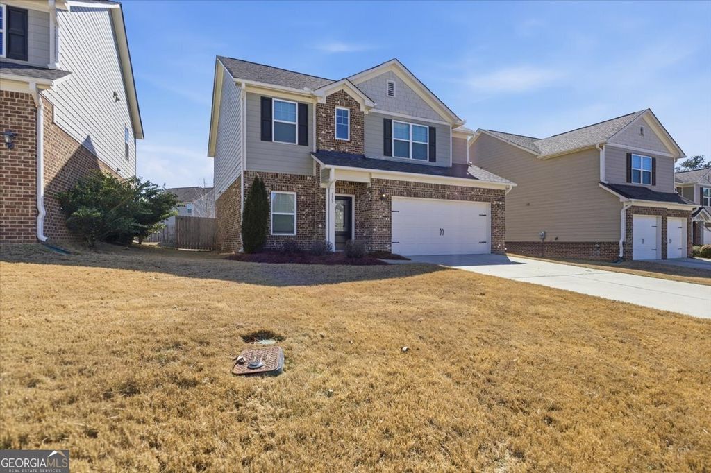 Photo of 171 Al Jennah Boulevard, Locust Grove, GA 30248 (MLS # 10696791)