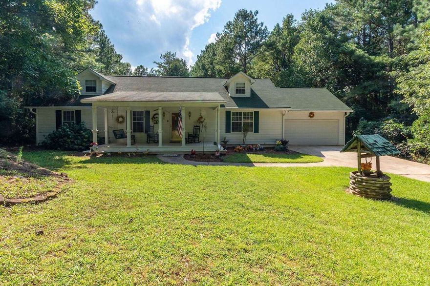 All the best of Fayetteville with a bit of country charm! This wonderful 3 bed, 2 bath home sits on over 1/2 acre in Deep Forest. White cabinets in the kitchen, tile flooring, breakfast nook, screened porch, spacious master bedroom with long closet, separate dining room and inviting front porch. In the backyard is a serene and private area complete with a fig tree and decking. With an extra parking spot on the property, you'll have room to park your cars with plenty of space in your driveway.  Extras include a storage outbuilding and fireplace unit. Plus being only 6 minutes to Trilith Studios, (formerly Pinewood), and 5 minutes to Piedmont Fayette Hospital, it's within a "stone's throw" of the best of Fayetteville! Ideally located within 26 minutes of the Atlanta International airport. For the location and quality, this home is an amazing deal! No HOA.  No blind offers.