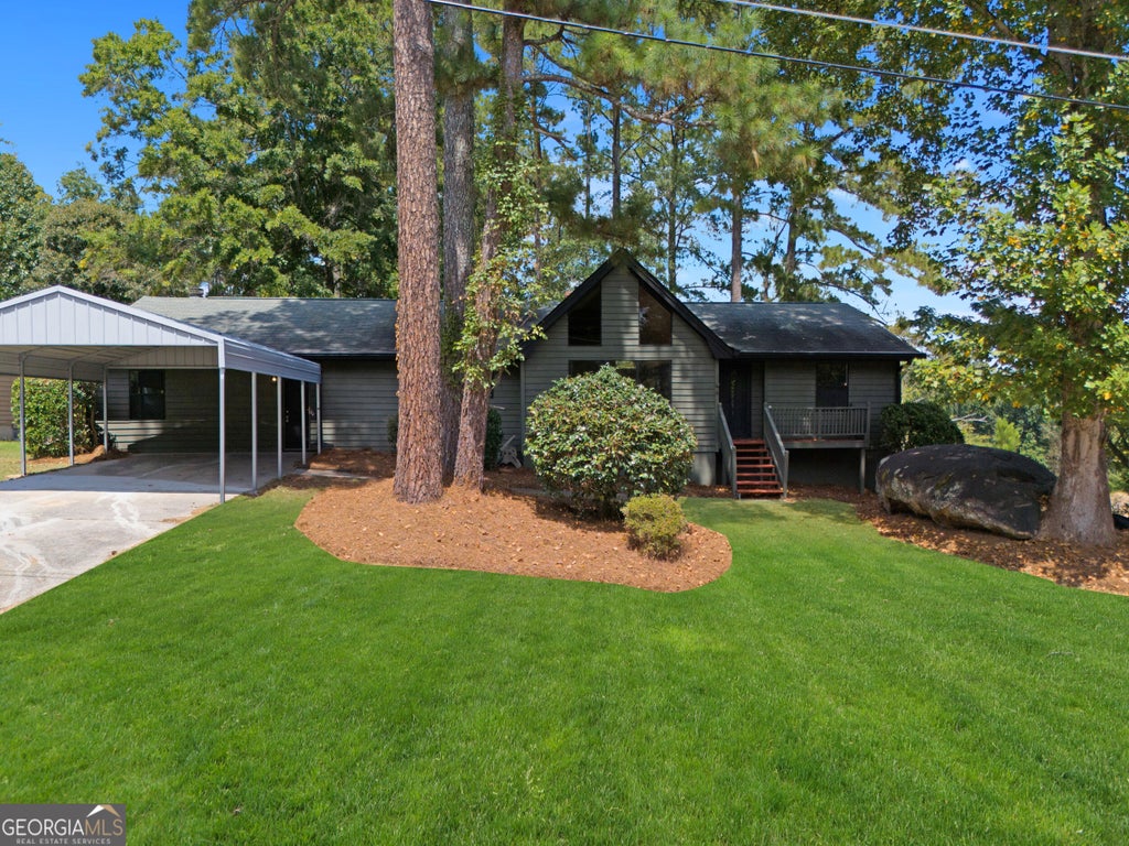 Photo of 7548 Lowilla Lane, Lithonia, GA 30058 (MLS # 10837921)