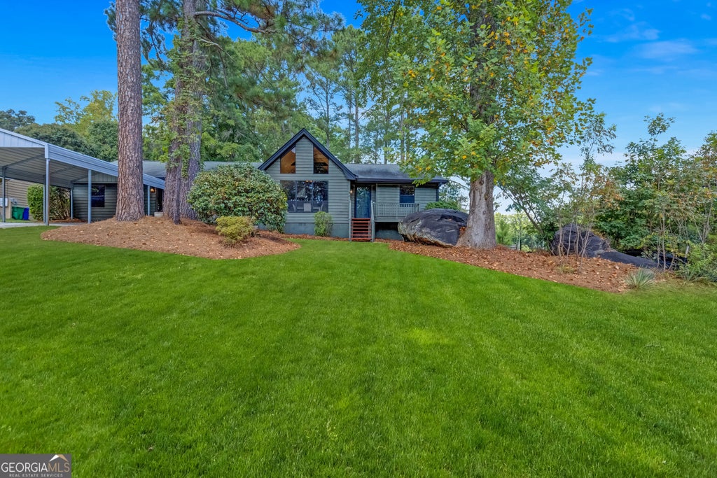 Photo of 7548 Lowilla Lane, Lithonia, GA 30058 (MLS # 10837921)