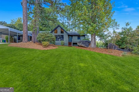 Photo of 7548 Lowilla Lane, Lithonia, GA 30058 (MLS # 10837921)