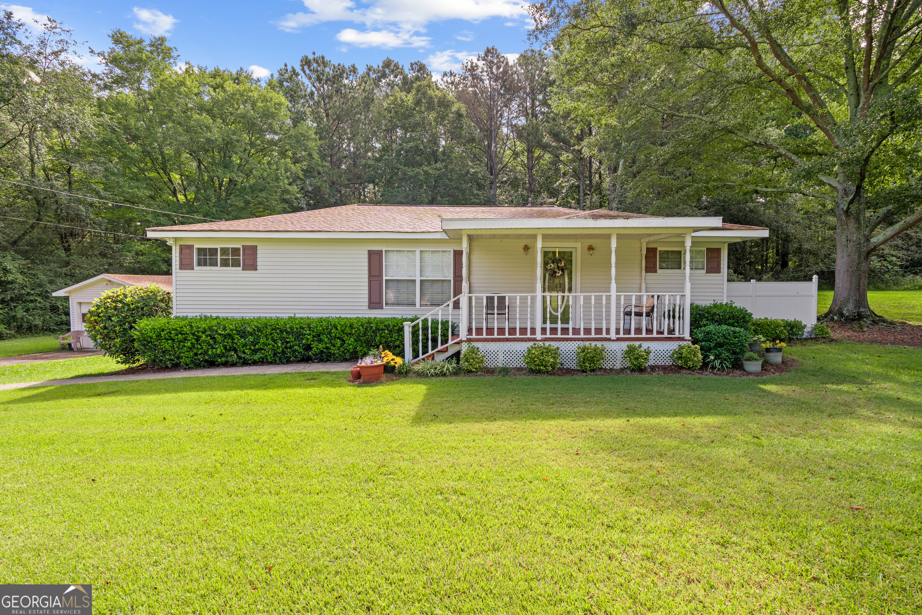 Discover this inviting 3-bedroom, 1-bath ranch nestled on a spacious 1.02-acre lot. Perfectly situated in a quiet area, this home offers both comfort and functionality. Enjoy brand new paint and carpet throughout, creating a move-in-ready feel. Enjoy mornings in the sunroom or relaxing in the backyard. This property also includes a versatile shop-great for hobbies, storage, or extra workspace. With its peaceful setting and plenty of room to spread out, this property combines the best of country living with everyday convenience.