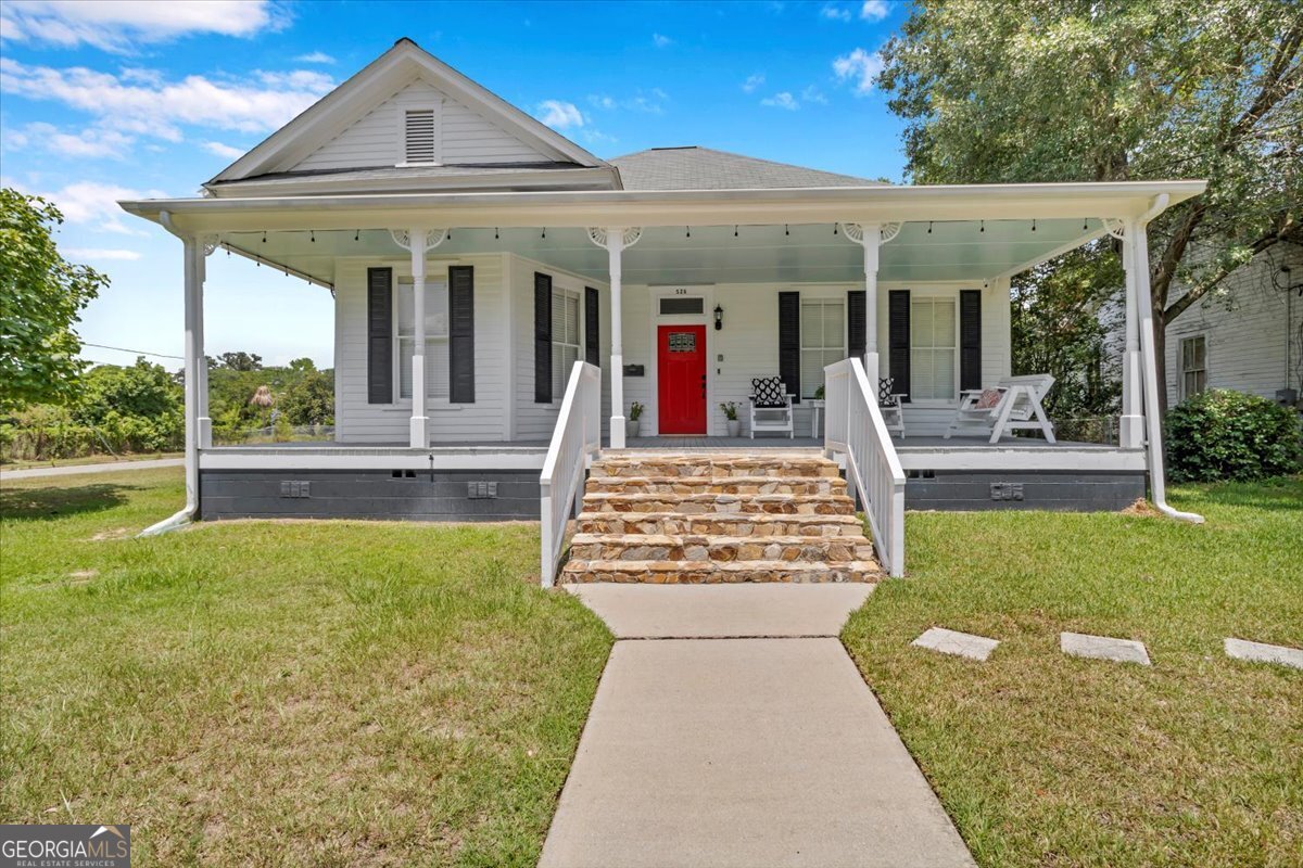Step inside this newly renovated turn of the century home located in the Historic District of Thomasville, Ga. This 4 bedroom, 3 bath home lets the sun shine in with an abundance of natural lighting. You won't be able to take your eyes off the refinished original pine floors, soaring ceilings, decorative fireplaces & ample storage everywhere. The chef's kitchen is definitely the heart of this home with cabinet-accent lighting, granite countertops, new stainless appliances & lots of room to entertain. This could be a great income producing property - think - Airbnb, VRBO or in-law suite. Possible 2 living quarters offering separate entrances, separate utility meter as well as your own private porch to relax & unwind. This stunning retreat is just a few blocks away from all the buzz of downtown Thomasville. This property has been well thought out from the updated electric, plumbing, gutters and air conditioning systems. Stylish finishes elevate this property to modern perfection including a detached garage with its very own Tesla charger. With just a short stroll or golf cart ride to downtown, you'll be sure to find the best restaurants, boutiques, and cultural attractions. Call today to schedule your private tour.
