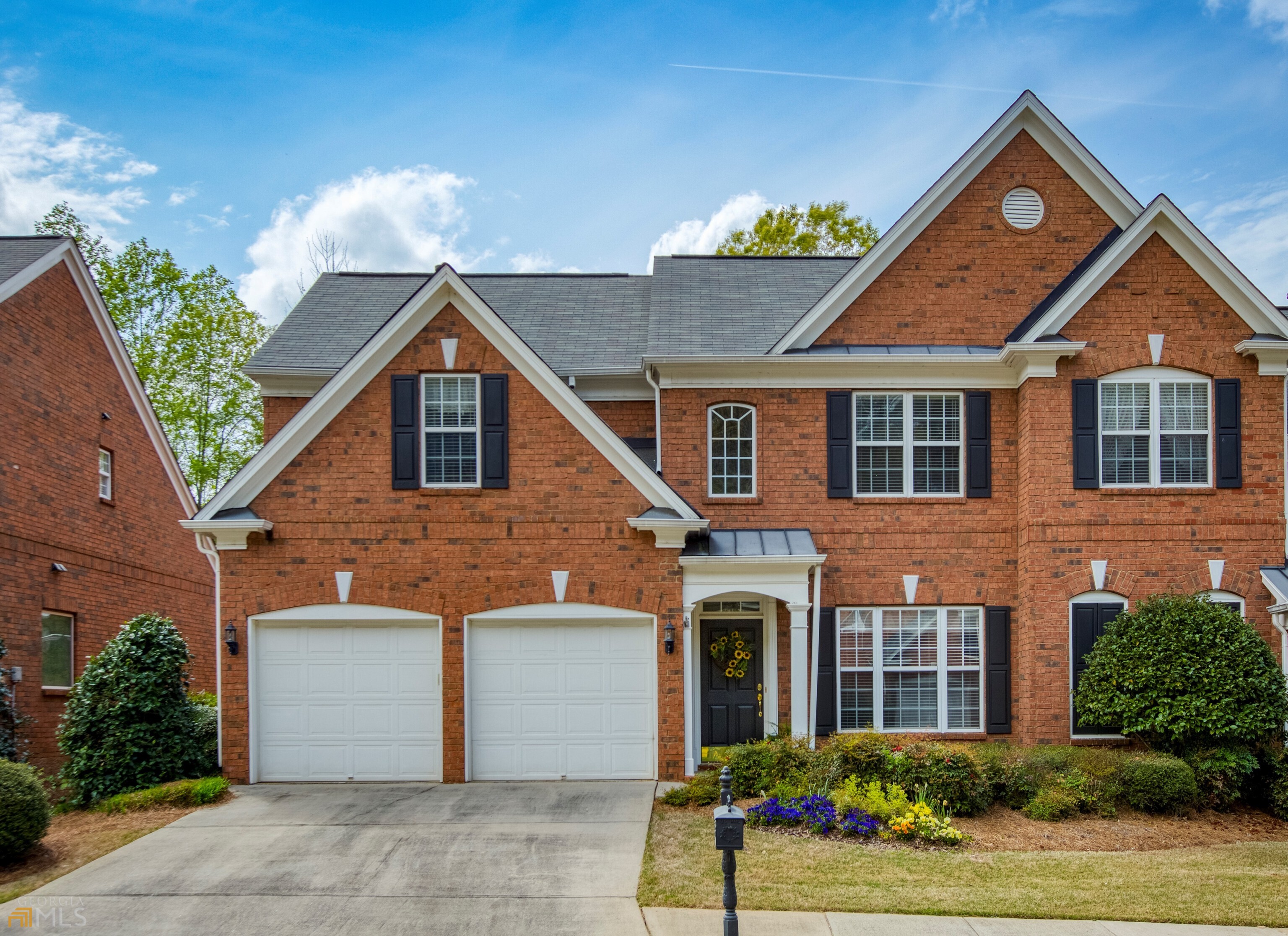 Sought after Alpharetta/Johns Creek area townhome, end unit with primary bedroom, kitchen, patio, laundry, & 2 car garage all on the main level. Delightful open plan feels as spacious as a single-family home. It is impeccably maintained, has a newer roof, hardwood floors and new carpet on main, wood blinds and tons of storage. Peaceful/ quiet community conveniently located near Publix, Kroger, Fresh Market, Starbucks, Restaurants, Banks, the Greenway, & Country Clubs!!! Minutes to 400, Newtown Park, the redeveloping Northpoint Mall, City of Alpharetta, Avalon, 2 Hospitals, and Doctors.