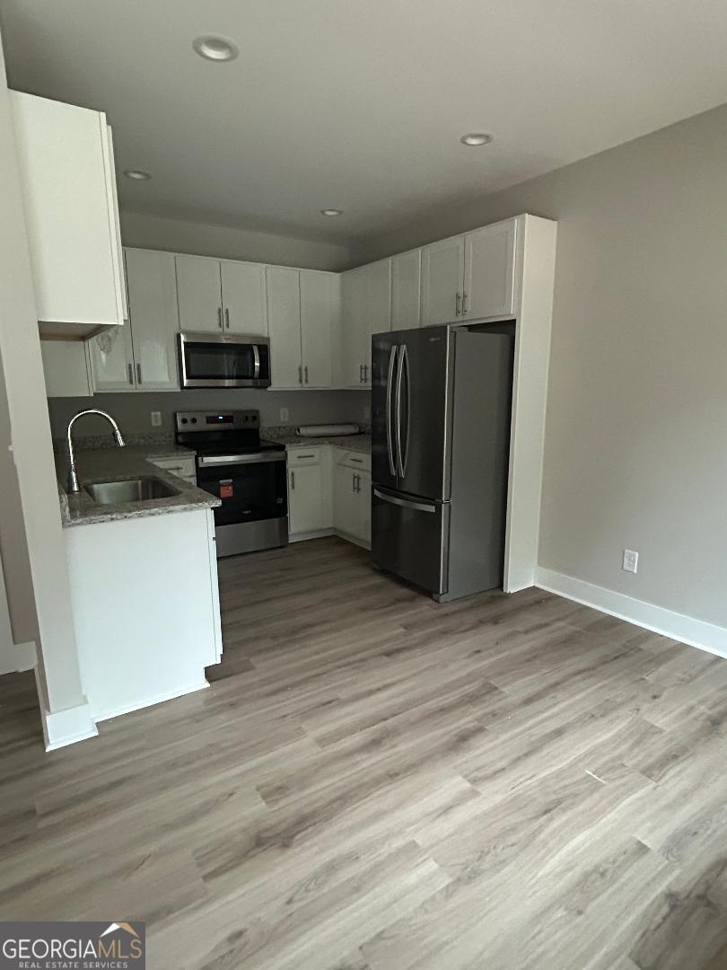 Photo of 5134 Avery Street, Covington, GA 30014 (MLS # 10795854)