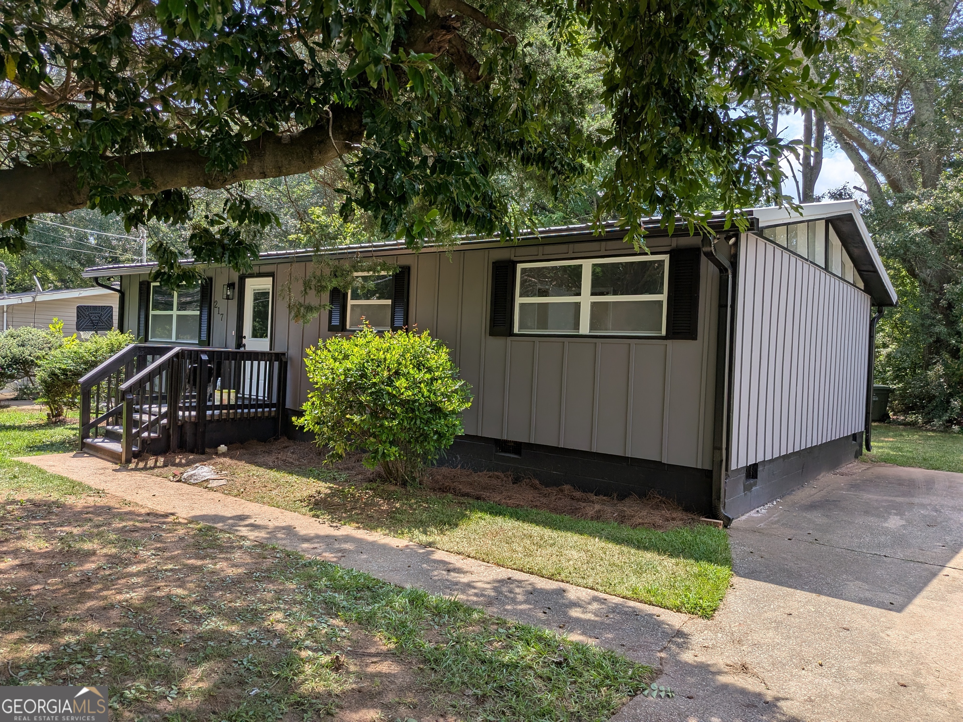 Charming house for sale in the city limits near Carrollton square. This updated home features new flooring, paint, HVAC, roof, kitchen cabinets, bathroom vanity, tile shower, granite through, and all new windows. With no HOA fees, tankless hot water heater, and a metal roof, this property offers both style and convenience for comfortable living.