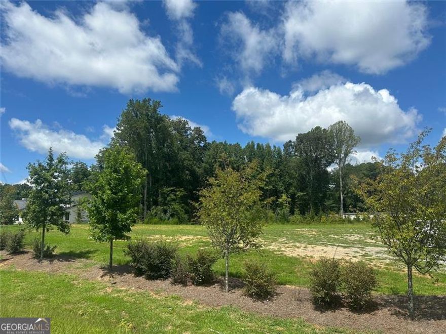 This prime location Alpharetta land lot is exactly one mile northwest of GA-400 and sees a TON of vehicle traffic on a daily basis. This property is already cleared, level, and has been surveyed and had a Phase 1 environmental study completed. Zoned CBD, this +/- 1.3 acre parcel is ready for a business to develop.