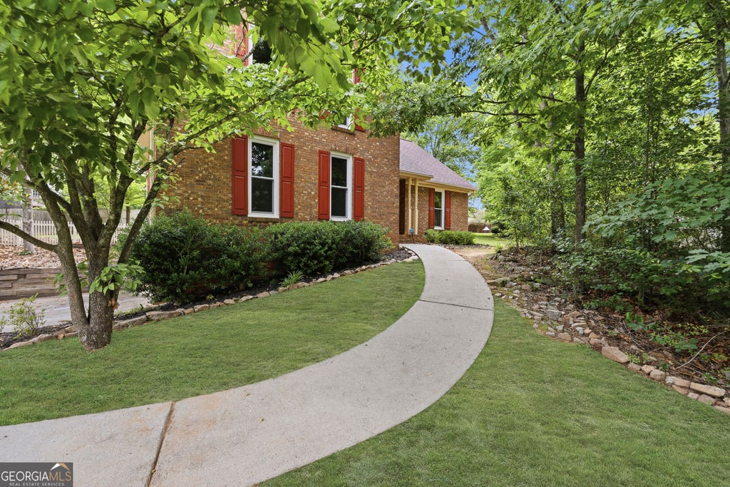 Photo of 3190 Hampton Ridge Way, Snellville, GA 30078 (MLS # 10785435)