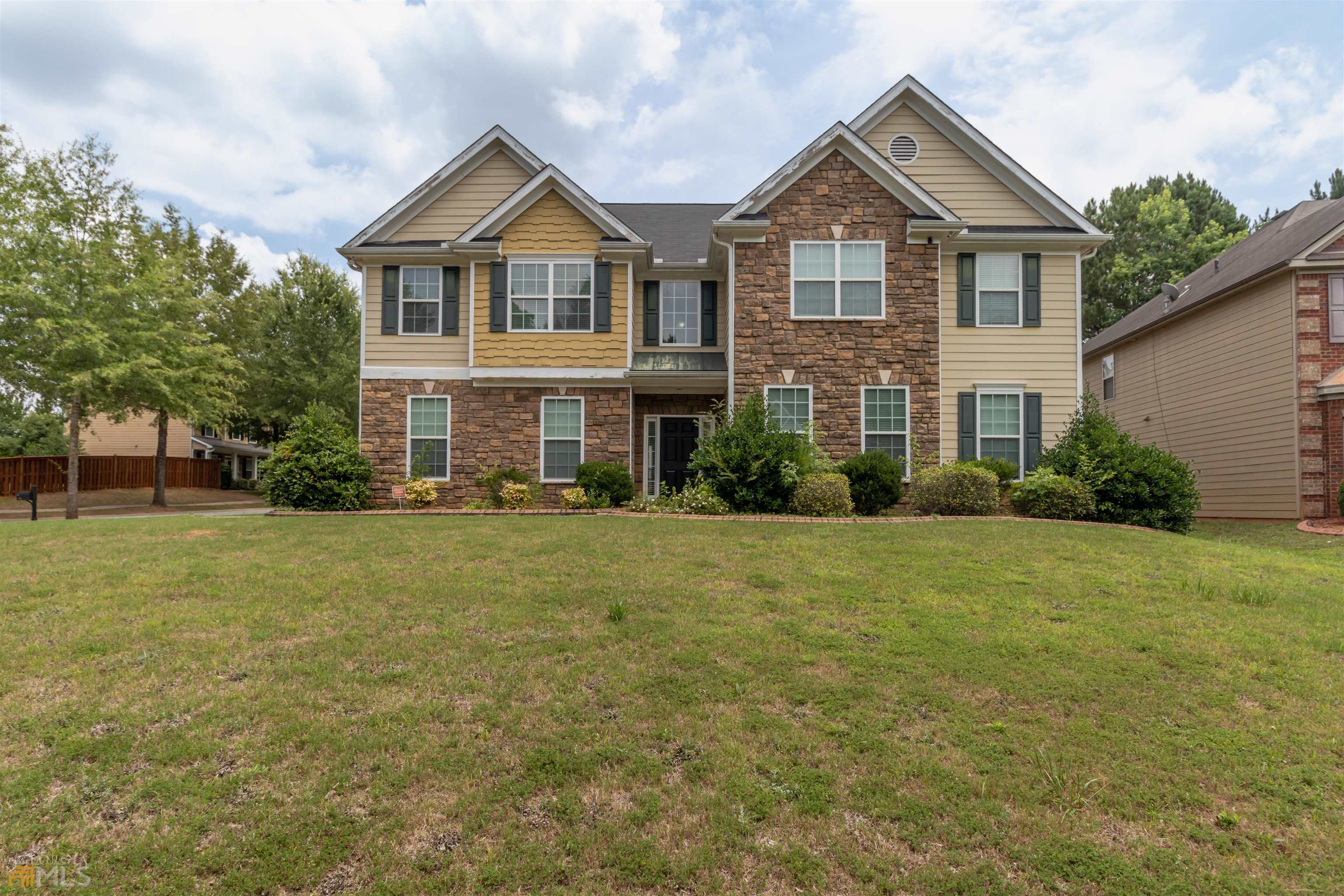Huge 5 bedrooms, 3.5 bath, corner lot home, in the gorgeous swim/tennis community of The Lakes at Cedar Grove. Three beautiful lakes available for your enjoyment. The entire interior has been freshly painted. Master bedroom is on the main level, with a very large ensuite bath and walk-in closet. Also on the main level is a separate dining room, family room with fireplace, kitchen with granite counter tops and breakfast area, and a half bath. Upstairs are 4 additional bedrooms, 2 full baths, and an enormous bonus loft area.
