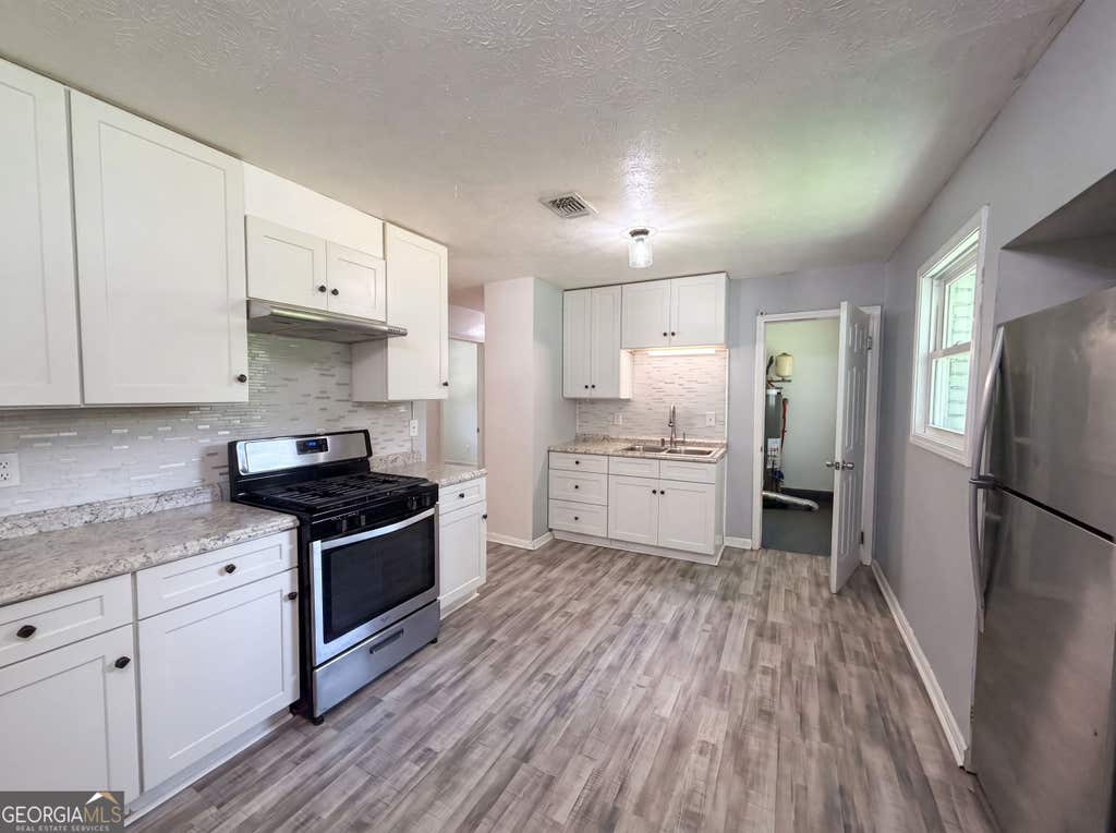 Photo of 6503 Jackie Lane, Austell, GA 30106 (MLS # 10793578)