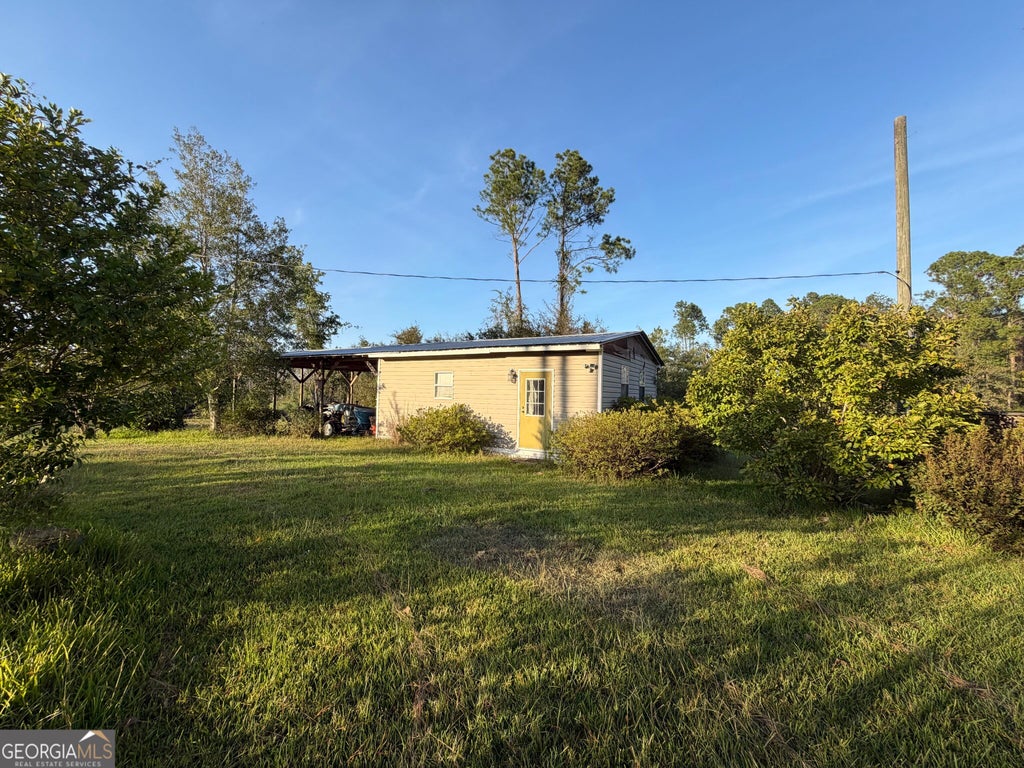 Photo of 698 Pat Dixon Road, Hazlehurst, GA 31539 (MLS # 10848471)