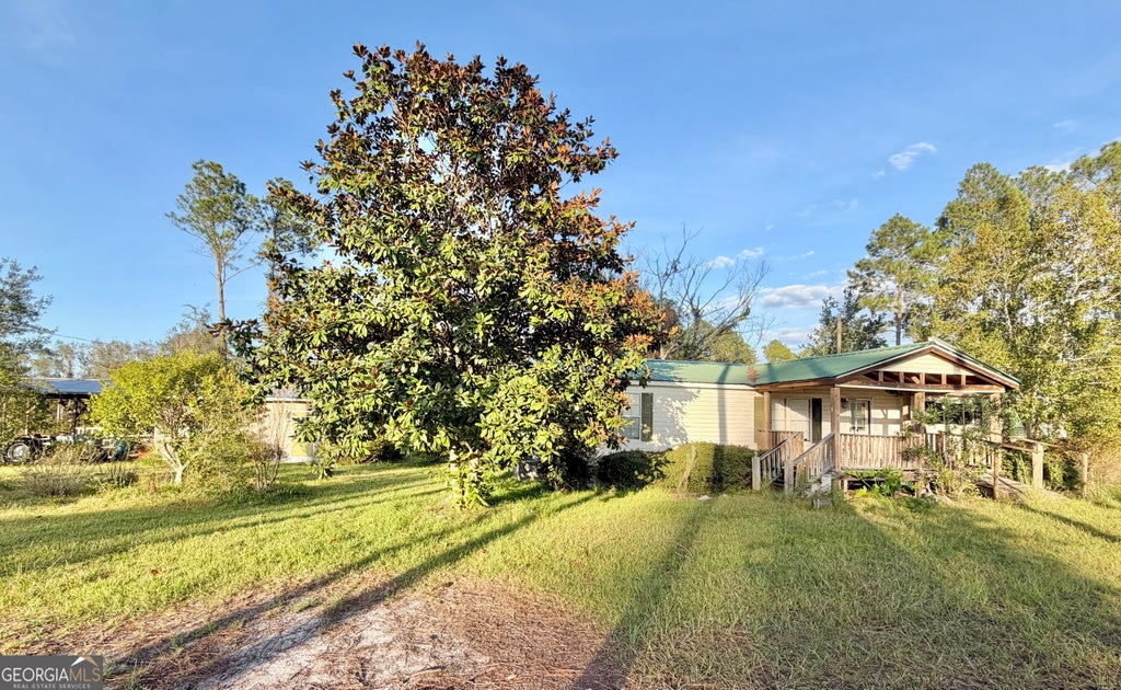Photo of 698 Pat Dixon Road, Hazlehurst, GA 31539 (MLS # 10848471)
