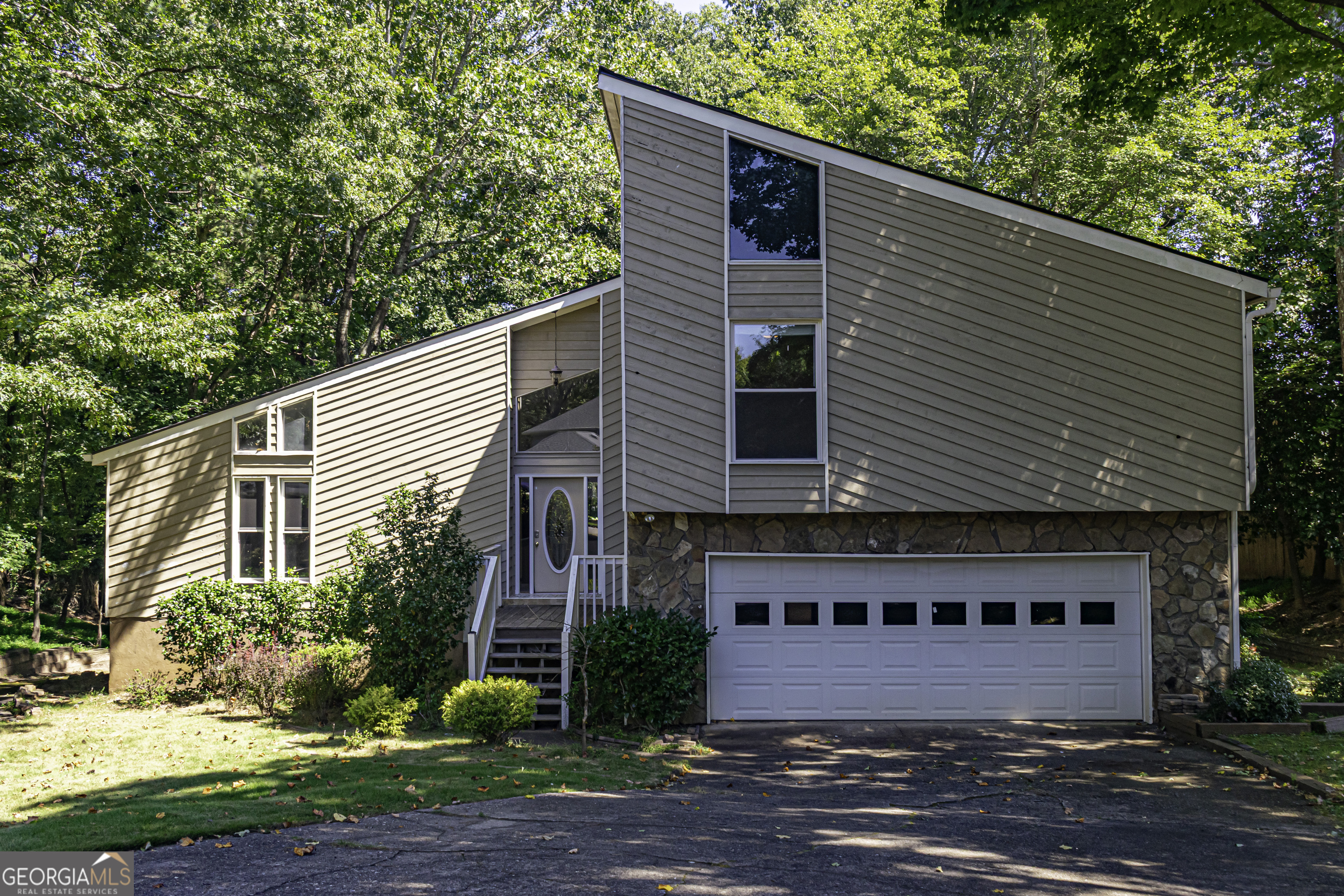 Welcome to Branch Valley Drive, a soft contemporary, multi-split level home. The home is within the Martins Landing planned community, which features a private lake and numerous amenities such as swimming/tennis. If you like space and openness - this is the home for you. From the breakfast area you look down to the family room which has a brick masonry fireplace. Also, there is a half bath and the laundry room. Upstairs are the bedrooms. The large master bedroom has a "princess" private deck to enjoy the outdoors. The master bath has been remodeled and a large (daylight) clothes closet has been constructed. The unfinished daylight basement has sliding glass doors to the exterior. The home needs cosmetics.