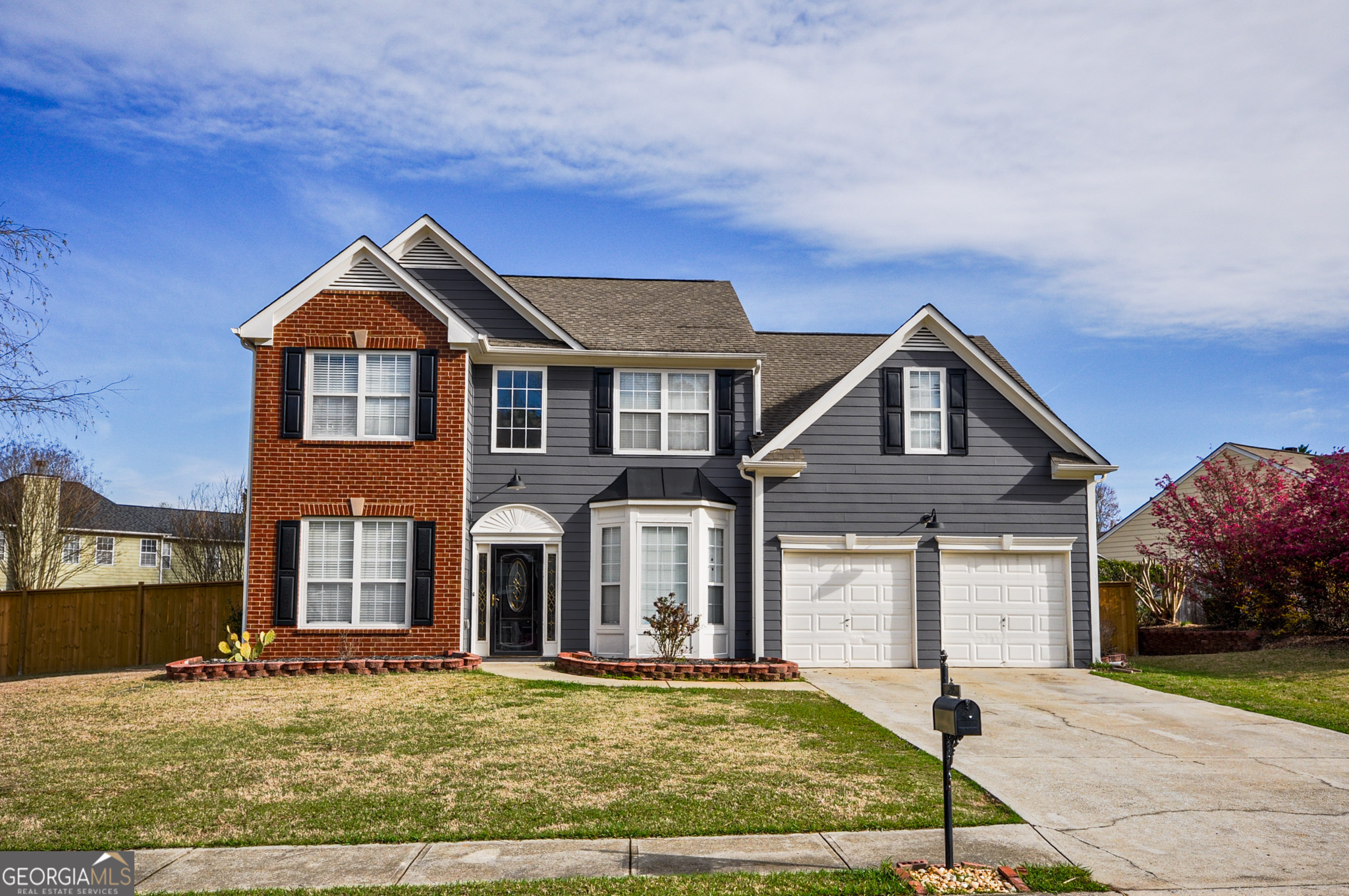 Rare opportunity to buy a 5 bedroom home for under $500k in Hillgrove High School District! Oversized level lot in swim community. Large bedrooms. . Private neighborhood lake is ready with fish waiting. Warm summer days ahead are ready to be had on your inviting patio, the dock on the lake, or hanging with friends at the pool! Need space for all those summer toys? There's plenty of storage in the extra deep garage. Near the Avenue at West Cobb.