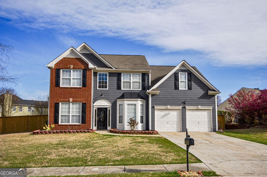 Rare opportunity to buy a 5 bedroom home for under $500k in Hillgrove High School District! Oversized level lot in swim community. Large bedrooms. . Private neighborhood lake is ready with fish waiting. Warm summer days ahead are ready to be had on your inviting patio, the dock on the lake, or hanging with friends at the pool! Need space for all those summer toys? There's plenty of storage in the extra deep garage. Near the Avenue at West Cobb.