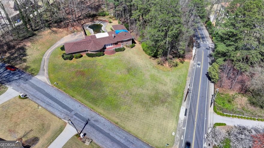 Exceptional 5.57-Acre Opportunity in the Heart of Buckhead  Unlock the potential of 5.57 acres across three contiguous lots in the prestigious, established residential enclave of Buckhead. This rare offering is a dream for developers, builders, renovators, or visionaries looking to craft custom luxury homes in one of Atlanta's most sought-after neighborhoods.  * Lot 1 (2.25 acres): A prime corner lot featuring an older home and pool, brimming with possibilities for renovation or redevelopment. With excellent road frontage, this parcel is perfect for a standout custom estate or investment project.  * Lot 2 (0.82 acres): A serene, forested retreat, offering privacy and a natural escape within the city. Ideal for a secluded homesite, recreational space, or preserving as a wooded oasis.   * Lot 3 (2.25 acres): Another expansive, tree-lined lot, providing ample room for additional homes, a family compound, or creative development, all surrounded by nature's tranquility.  Located just minutes from Buckhead's upscale shops, the serene Blue Heron Nature Reserve, and the vibrant Chastain Park, this property offers the perfect blend of seclusion and urban convenience. Top-rated schools are also nearby, making it an ideal setting for families or future residents.  This is a standout opportunity to own a substantial piece of Buckhead's coveted landscape, with endless possibilities for customization. All three parcels are to be sold together "As Is" in a cash-only transaction, ensuring a streamlined process for the right buyer. Don't miss your chance to shape the future of this remarkable property!