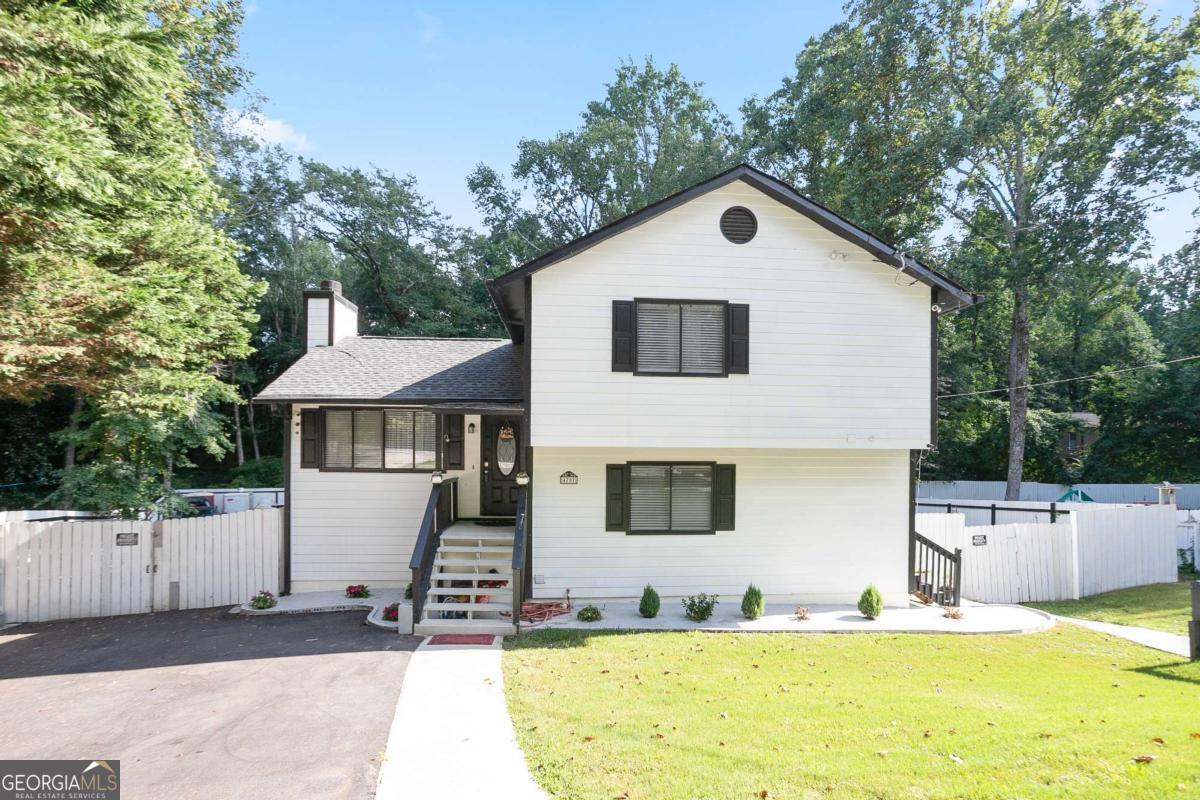 MOVE-IN READY FULLY RENOVATED HOME IN PRIME NORCROSS LOCATION! Welcome to 4707 Greenway Rd, a beautifully updated 3-bedroom, 3-bath split-level residence with a partially finished basement-perfectly situated in a quiet, established neighborhood just minutes from I-85, Satellite Blvd, shopping, and dining. This home offers the ideal combination of comfort, style, and convenience. Step into a bright, modern kitchen featuring granite countertops, stainless steel appliances, and a fresh, open layout made for everyday living and entertaining. The partially finished basement includes a brand-new full bathroom and has been professionally waterproofed-ideal for a guest suite, home office, or second living area. UPDATES INCLUDE: The roof and A/C unit are only 3 years old. New water heater. New LVP flooring throughout. New driveway. Leveled yard with fresh asphalt pavement. This home has been thoughtfully renovated from top to bottom and is truly move-in ready. Whether you're a first-time buyer, a growing family, or simply looking for a fresh start in a central location, this one is a must-see.