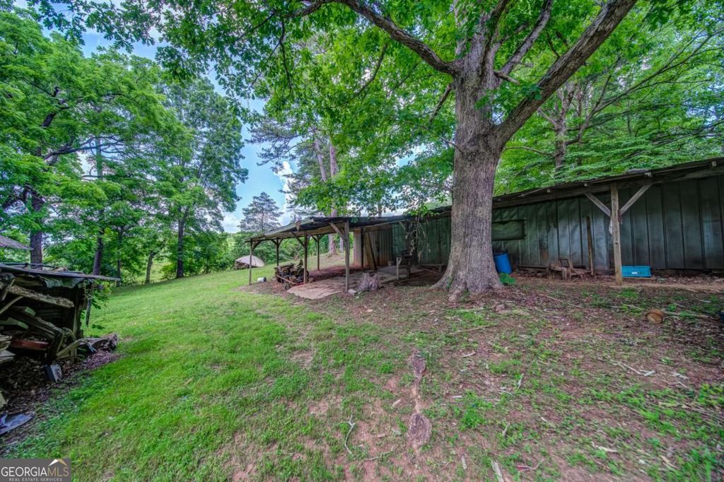 Photo of 261 Steve Tate Highway, Marble Hill, GA 30148 (MLS # 10754590)