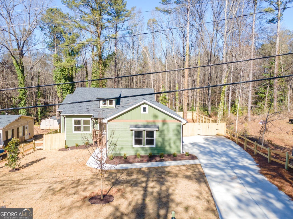 Photo of 6138 Green Acres Drive SW, Covington, GA 30014 (MLS # 10856884)