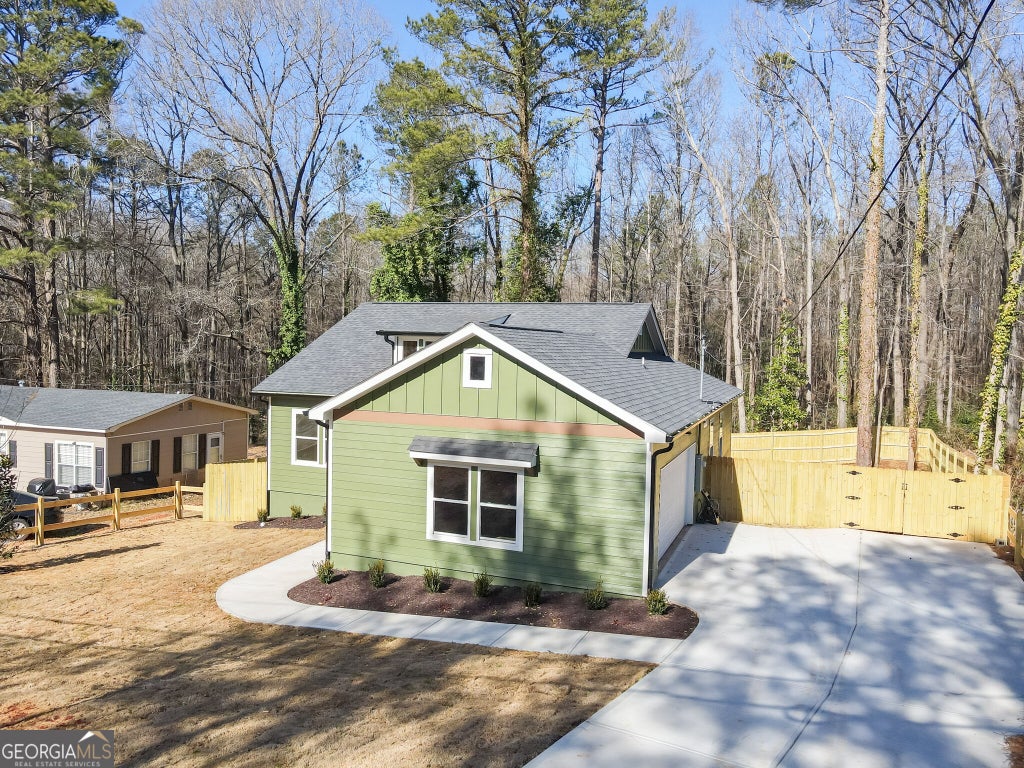 Photo of 6138 Green Acres Drive SW, Covington, GA 30014 (MLS # 10856884)