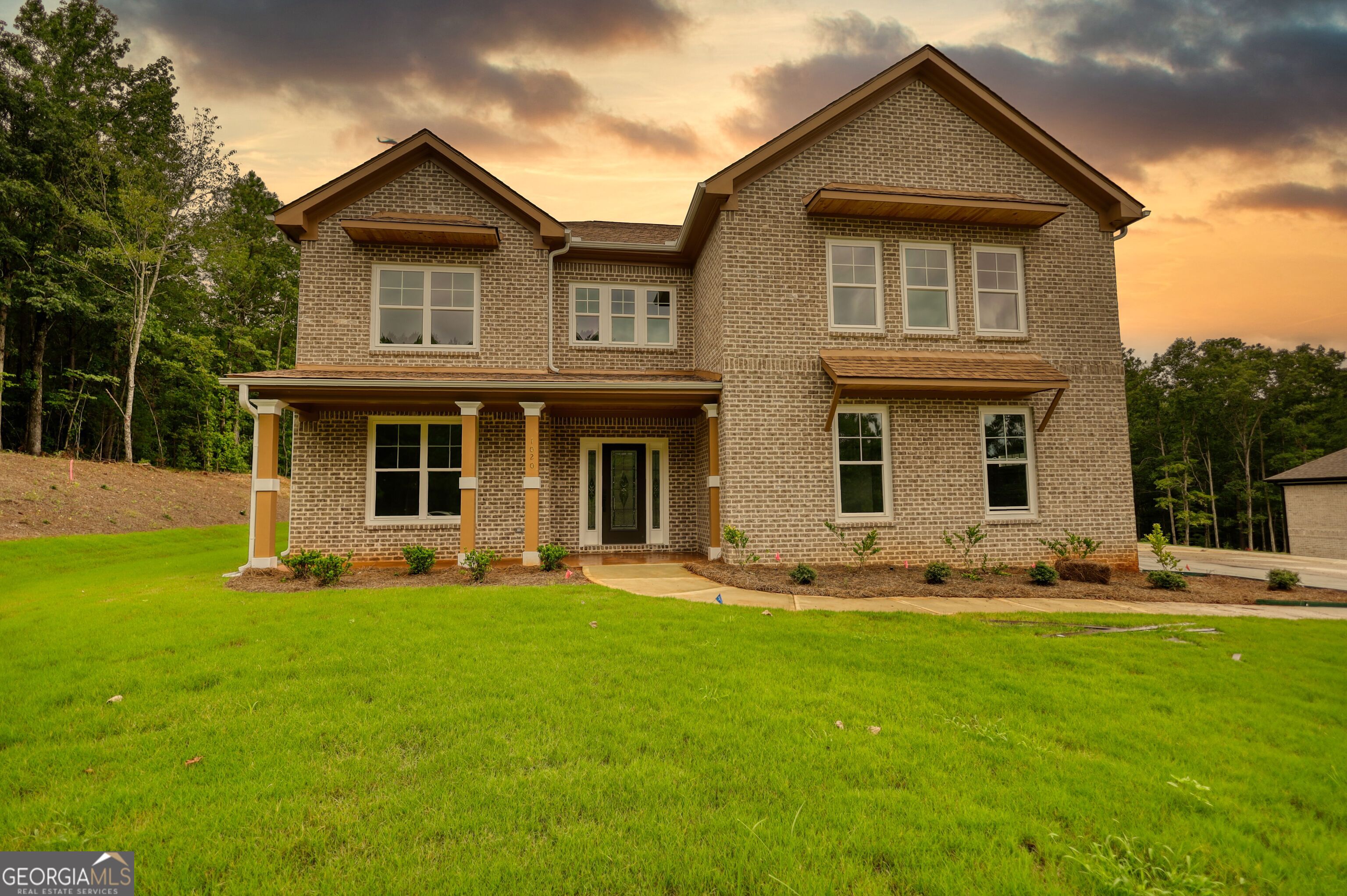 This 4,305 sq ft all-brick custom home offers 4 bedrooms-each with its own private bath and walk-in closet. Soaring two-story ceilings and a dramatic wall of windows fill the living area with light, while the upstairs loft overlooks the living room for a stunning open feel. The gourmet kitchen features stainless steel appliances, quartz countertops, a custom island, and walk-in pantry, plus a custom mud room for everyday convenience. Elegant tile showers in every bathroom and can lighting throughout add luxury at every turn. Enjoy the covered patio with wood ceilings in a peaceful, no-HOA neighborhood. Schedule your showing today-this one will go fast!