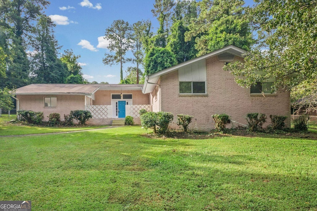 Photo of 1616 Bethsaida Road, Riverdale, GA 30296 (MLS # 10854600)