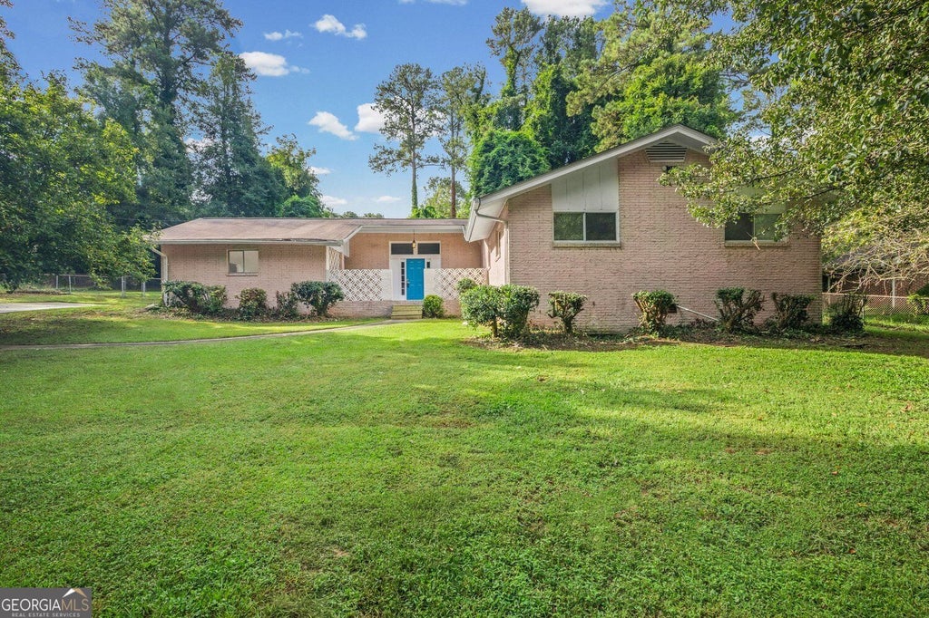 Photo of 1616 Bethsaida Road, Riverdale, GA 30296 (MLS # 10854600)
