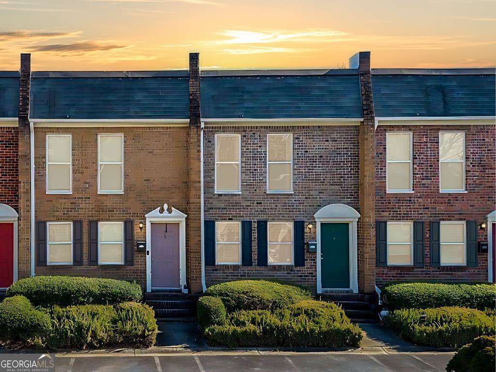 Renovated Townhome tucked within the gated Avalon Townhomes community in a prime area of Sandy Springs. Easy access to GA400, MARTA, Dunwoody, and Historic Downtown Roswell. Nature lovers can explore the Chattahoochee River & Azalea Park. The bright, airy living space features fresh paint, LVP flooring, and an open-concept floorplan. On the main level, the oversized living space flows into the dining area with access to the back patio. Off the dining area is the kitchen. The newly renovated kitchen boasts crisp white shaker cabinets, quartz countertops, a subway tile backsplash, and stainless steel appliances. A full bath completes the main level. As you head upstairs, two spacious bedrooms share access to a full bathroom. The laundry is conveniently located on the upper level. Outside, enjoy a private fenced patioCoperfect for morning coffee. Community Amenities include a pool, clubhouse, gym, tennis courts & a dog park. Located in the North Springs High School District.