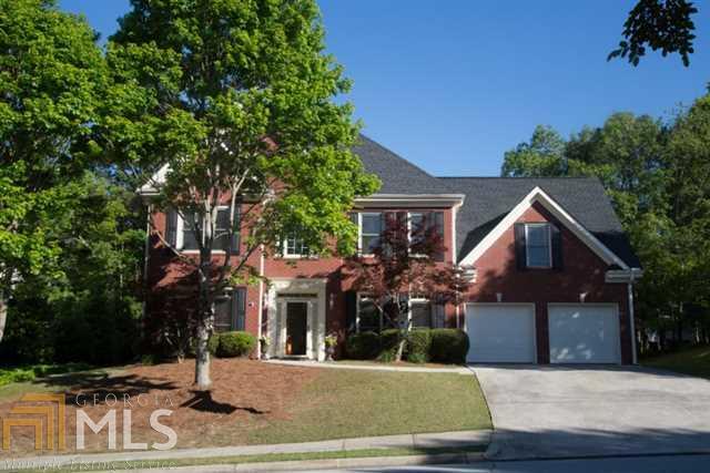 Spacious Open Floor Plan including 4 Bed 2.5 Bath in sought after Hamilton Mill subdv. Updates Galore: new roof, AC, hot water tank, new thick blown insulation in attic & freshly painted interior and exterior. Kitchen updates include Exotic granite, glass backsplash, new stainless dishwasher, sink w/commercial faucet & new disposal. New light fixtures throughout. Family Room w/ gas fireplace & view to the huge level backyard w/ room for a pool! Tons of storage w/ 4 walk in closets, extra storage room in garage plus storage closet under stairs. Two large master suites -