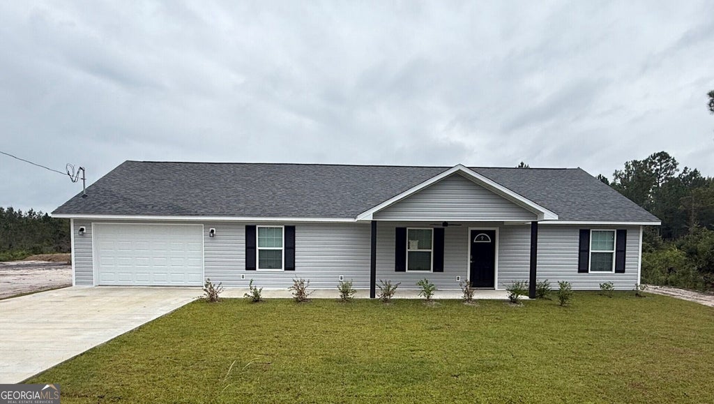 Photo of 1135 Black Hawk Drive, Waynesville, GA 31566 (MLS # 10871418)