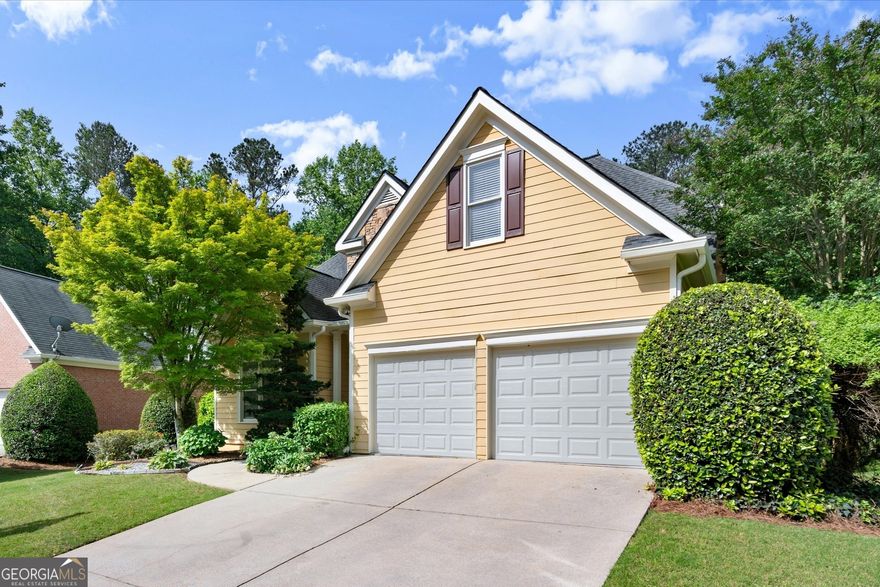 Don't miss your chance to call this gorgeous property with primary bedroom on main in East Cobb's sought-after swim/tennis community of Lost Forrest home!  Enter through double front doors to a 2-story foyer, with gleaming hardwood floors and fresh neutral paint throughout. Vaulted living room makes a statement while being a cozy place to gather, and is centered by a lovely gas fireplace. Flex space at the front of the home flows to formal dining room, into beautiful kitchen with white cabinetry that is open to light and bright sunroom. Primary bedroom on main floor features tray ceilings, a spacious bathroom with double vanities, separate tub and shower, and private water closet, as well as spacious closet. Upstairs, find 3 spacious secondary bedrooms and 2 baths, with brand new carpet.  Fully finished basement featuring new carpet, with plenty of bonus space and an additional bedroom, full bathroom, and a spacious walk-in closet--and enjoy direct access to the backyard, ideal for entertaining or private entry. Additional storage space provides extra convenience. Deck was rebuilt just a few years ago and is a fabulous place to entertain and look over your flat, fenced yard. Garage is already suited up for your Tesla with an EV charger installed. Fantastic location in the neighborhood a short distance from all the amenities including clubhouse, gorgeous pool, playground, tennis & pickleball courts! Social activities are offered throughout the year, and zoned for top performing East Cobb schools, you'll be right in the heart of East Cobb and a short distance to everywhere you want to be--Avenues, downtown Roswell, tons of shopping & dining options, parks and more!