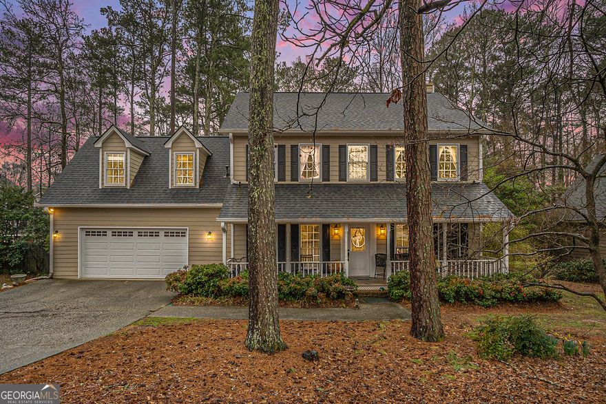 Located in the heart of one of Marietta's most desirable neighborhoods, this 4 bedroom and 2.5 bath home features an inviting, private gunite in-ground pool. Huge deck overlooking partially wooded back yard. Covered front porch for relaxing. Convenient to Marietta Square, schools, and Kennesaw Mountain trails. Pool pump, water heater, deck, and roof replaced in last few years. Oversized master suite includes new flooring throughout, oversized tub, double shower, bidet and updated double vanities. Laundry room upstairs near bedrooms for convenience. Formal living and dining rooms. Kitchen features new appliances and a lovely view to the backyard from dining nook. Family room with brick fireplace and access to deck. Double garage with additional storage. Ready to move in and make it your own!