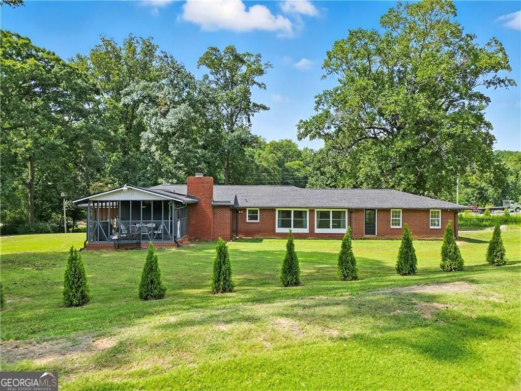 Photo of 4246 Cartersville Highway, Dallas, GA 30132 (MLS # 10670160)