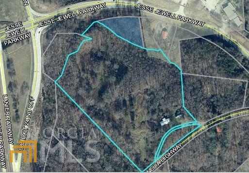 POTENTIAL COMMERCIAL! 16.25 +/- spacious acres with frontage on Jesse Jewell and Old Corneila Hwy. Premium location with endless possibilities. This property is located right at I-985 exit 24, with sewer access nearby. Additional acreage assemblies possible. Two homes on property.