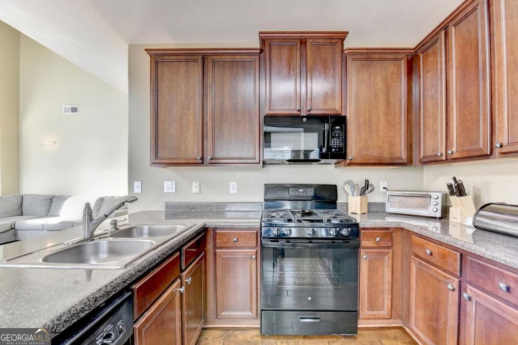 Photo of 1208 Park Pass Way, Suwanee, GA 30024 (MLS # 10686206)