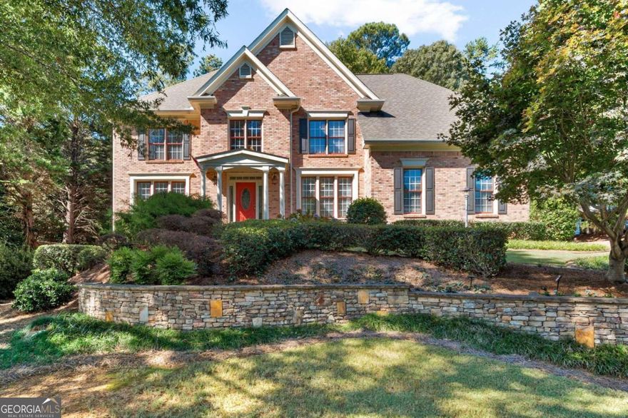 Fabulous OAKLEIGH! Look no further for the perfect place to call HOME! Brick (3 sides) beauty has en suite guest rm on  main (currently used as office) Chef's kitchen has granite and SS appliances & opens to light filled 2 sty fireside  family room! Windows have special tint so furniture remains like new! A rear staircase leads up to secondary  bedrooms-one has ensuite bath and walk in closet, also jack-n-jill bedroom has updated bath w/two sinks! Big laundry  room has sep. washtub. Oversized primary has amazing recently updated spa-like bath w/frameless shower/sep tub! Walk  in closet! Hardwoods on main, Sep Living rm and banquet sized dining room for ease of entertaining. Daylight Basement  is loaded with possibilities! Media room and equip. stays for buyers, bar with sink, microwave and spot for fridge  plus full bath is so convenient! Space for playroom or recreation galore! Also has some unfinished area for much  needed storage. Private fenced backyard is oasis w/lavish landscaping and deck and stone patio. Side entry garage plus  parking pad adds to the lovely curb appeal of this home! Neighborhood amenities are second to none! Award winning  schools! Quality abounds in this Barry Holder built home. Meticulously maintained; systems updated, roof fairly new.  This home has it all!SHOWINGS TO BEGIN MONDAY MARCH 4 10:00AM.