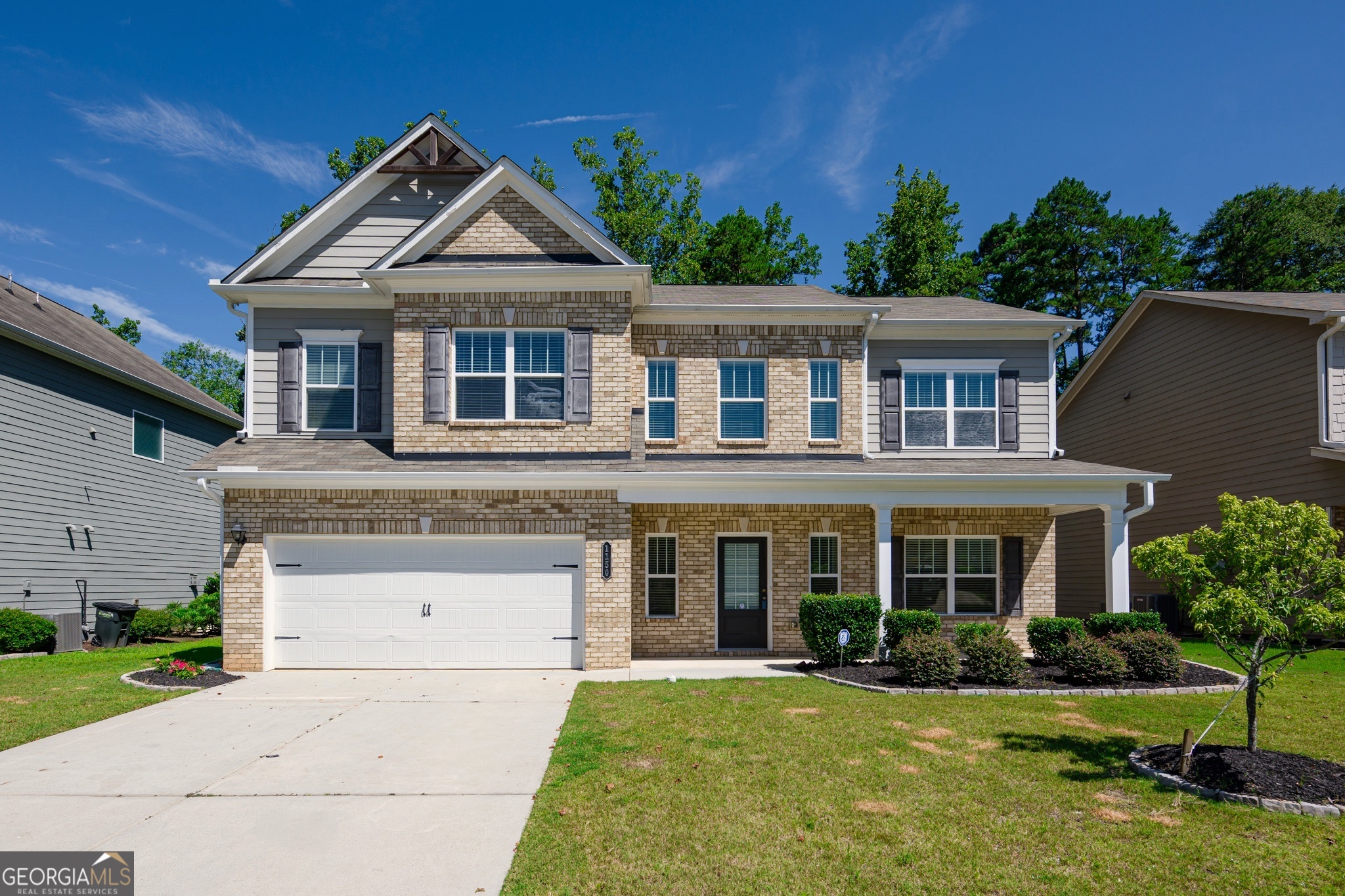 This charming two-story home offers a perfect combination of space, style, and location. Situated in the highly sought-after Sycamore Creek neighborhood, this home is ideal for families looking for comfort and convenience. Brick-front exterior with inviting covered porch, Bright and open layout with All hardwood floors throughout the main level, Elegant formal dining room with wainscoting and crown molding, Spacious living room with cozy fireplace and large windows, Modern kitchen featuring granite countertops, stainless steel appliances, tile backsplash, and a center island, Upstairs loft - perfect for a home office, study area, or media room, Laundry room with washer and dryer included, Private, fenced backyard with patio - great for relaxing or entertaining, Quiet, sidewalk-lined community with mature trees and well-kept homes, Just minutes from Lake Lanier, George Pierce Park, and the Suwanee Creek Greenway, Close to Sugar Hill Town Center - enjoy local shops, dining, and events
