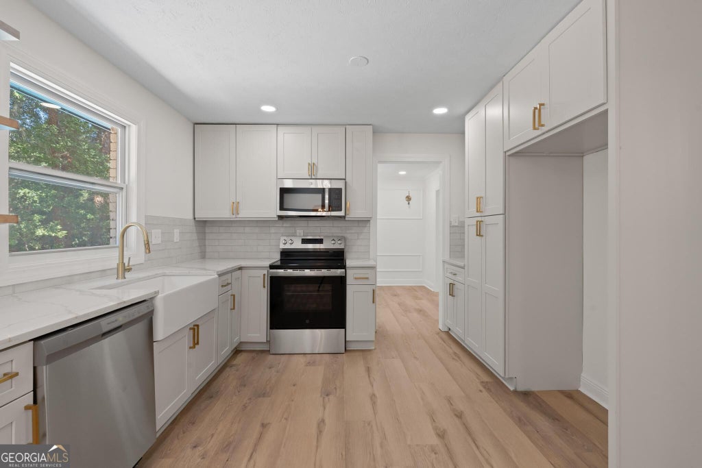 Photo of 105 Lafayette Drive, Fayetteville, GA 30214 (MLS # 10835411)
