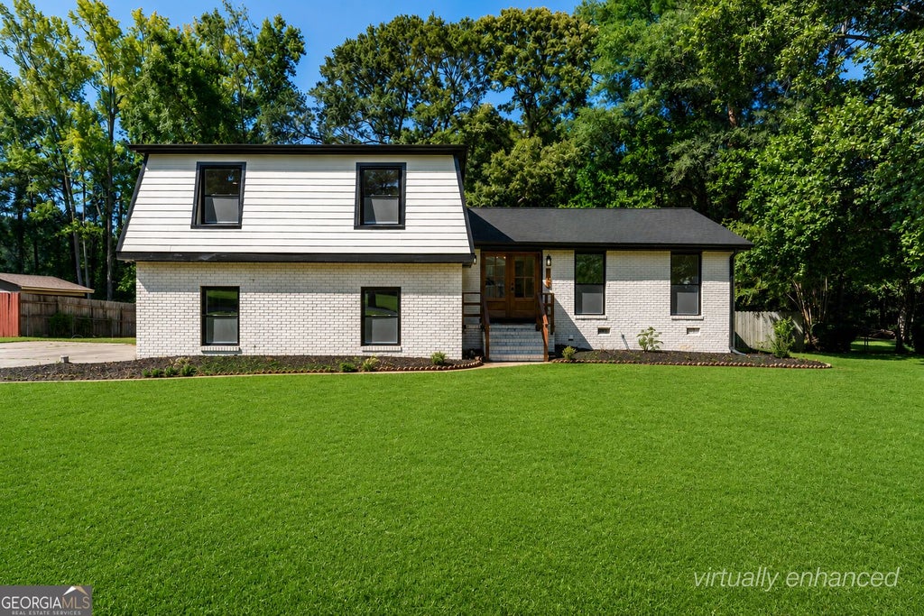 Photo of 105 Lafayette Drive, Fayetteville, GA 30214 (MLS # 10835411)