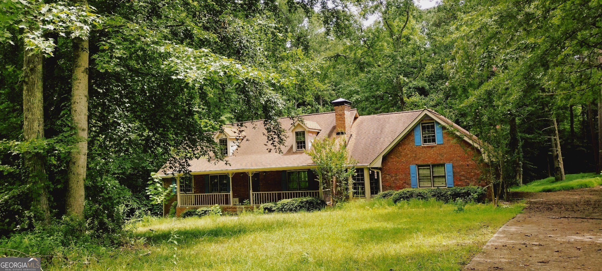 Large traditional style home with partial basement! Includes spacious lot with endless possibilities. This single-family home is nestled in a vibrant and welcoming neighborhood, offering the perfect blend of city convenience and suburban charm. Easy access to shops, restaurants, and major highways for convenient commuting. Convenient to Lake Ridge Park and Lake Lanier. Bring your builder or contractor to finish construction and maximize the endless potential this property has to offer. Schedule a viewing today and make this home your own!