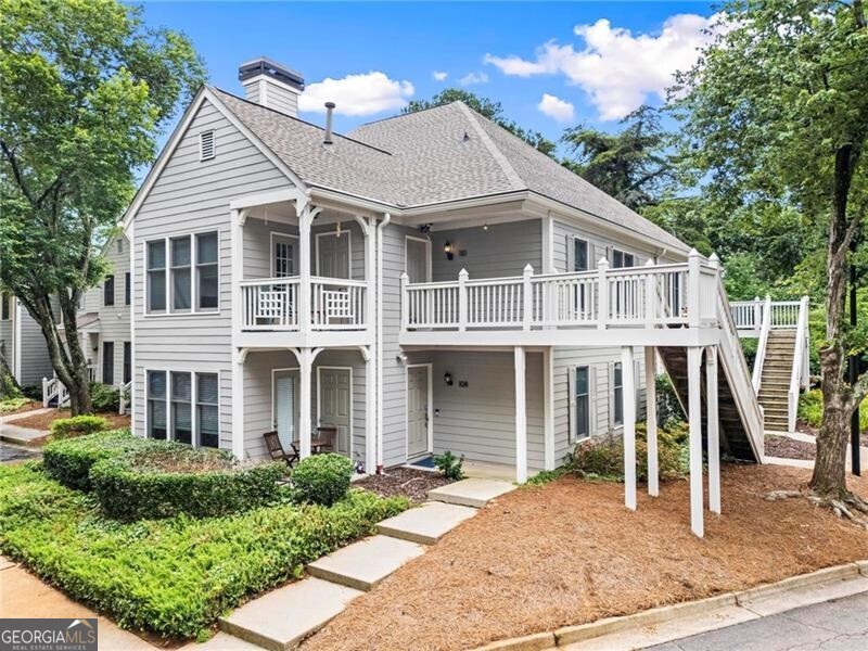 Welcome home to the perfect blend of style, comfort, and convenience! This beautifully updated 2-bedroom, 2-bathroom condo is move-in ready and ideally situated in a prime Sandy Springs location. Located on the second floor, this light-filled home features wood flooring throughout, fresh modern lighting, and a smart, open-concept layout that makes daily living and entertaining a breeze. The renovated kitchen shines with stainless steel appliances, quartz countertops, and stylish new cabinetry. The fireside living room flows seamlessly into the dining area and a bonus sunroom-flooded with natural light and perfect for a dedicated home office, cozy reading nook, or your personal plant haven. Step out onto your private covered patio to enjoy peaceful mornings or unwind at the end of the day. The spacious primary suite features two closets and a fully renovated ensuite bath with quartz counters and modern finishes. The secondary bedroom is privately positioned and also offers a fully updated bath-ideal for guests or roommates. Enjoy thoughtful upgrades throughout, including: new light fixtures, full-size washer and dryer, wood floors throughout, quartz countertops in kitchen and baths, bonus room/sunroom for office or flex space and private covered patio. All appliances remain with the home including washer and dryer. Perfect location close to it all. Quick access to all highways, Sandy Springs/North Springs MARTA stations, shopping, grocery stores and dining. The community offers amenities, including a pool, tennis courts, and low HOA fees that cover trash removal, termite protection, and exterior maintenance. Whether you're commuting, exploring the city, or simply enjoying a relaxing day at home, this condo checks every box!