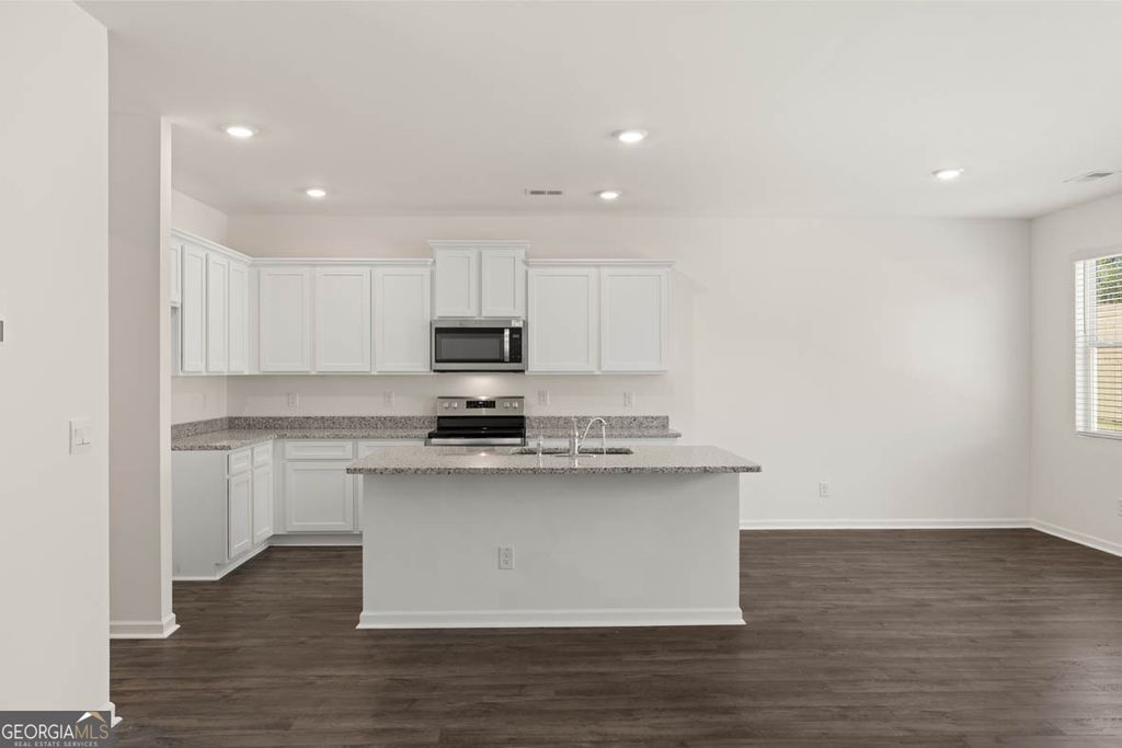 Photo of 1307 Aura Ln, Lawrenceville, GA 30045 (MLS # 10715342)