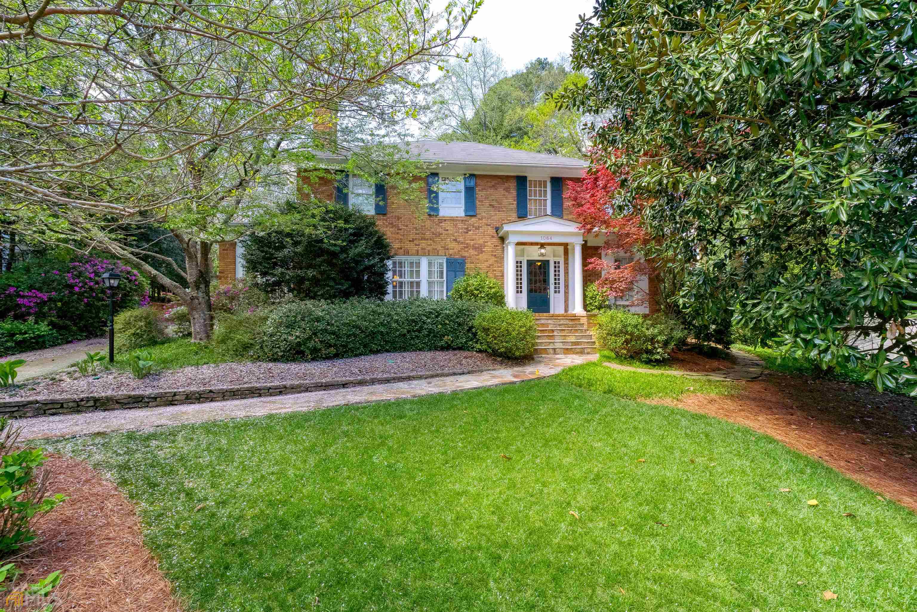Renovated Classic Druid Hills home in the most desirable section of this sought-after neighborhood with a walk-out back yard, separate carriage house apartment and 2 car garage with workshop. Improvements comprise a newly completed master suite, Refinished Hardwood Floors, Interior Paint, renovated kitchen and baths and professional landscaping; original architectural details include high ceilings, light-filled windows, woodwork & hardware. Enjoy gracious living & dining rooms, lovely sun-filled foyer, two private offices, spacious back yard, carriage house and garage, all meticulously maintained; 3 blocks to Emory Village, Emory University & CDC, surrounded by parks including Historic Olmsted Park, close to Druid Hills Golf Club.