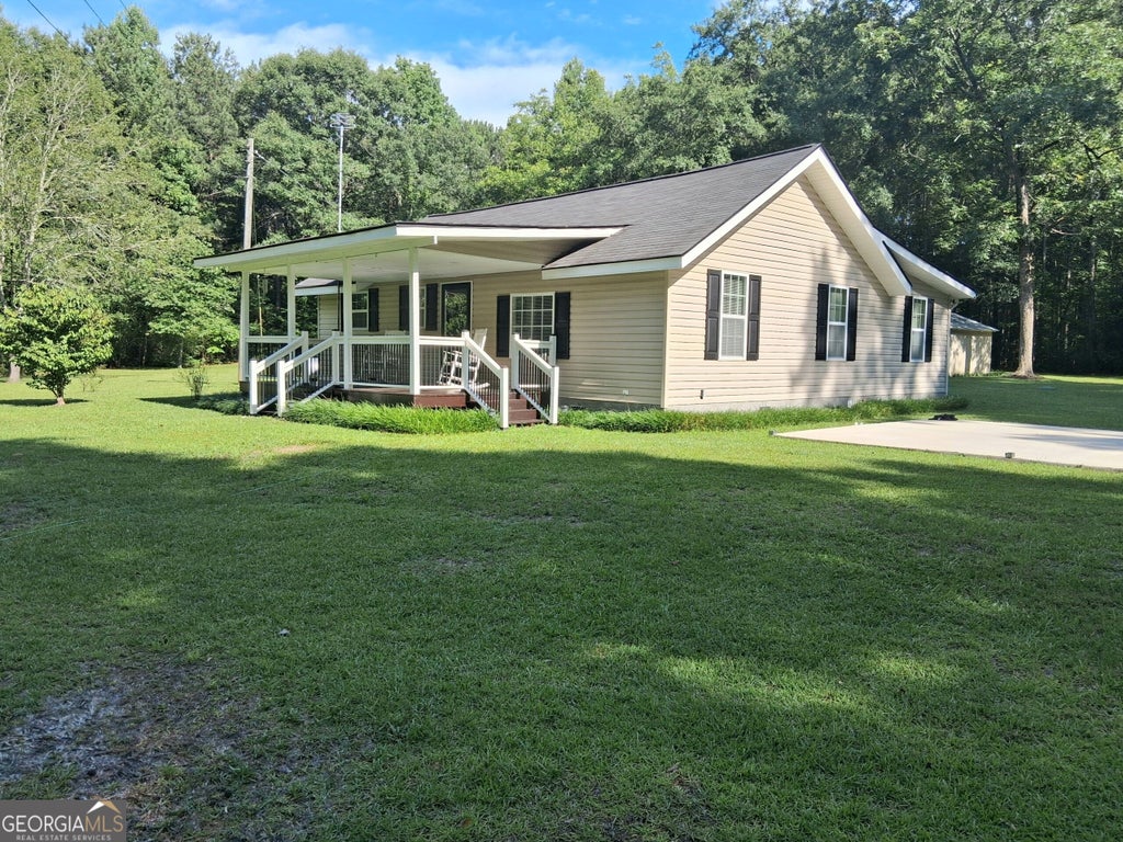 Photo of 6599 Ga Highway 42 N, Forsyth, GA 31029 (MLS # 10846007)