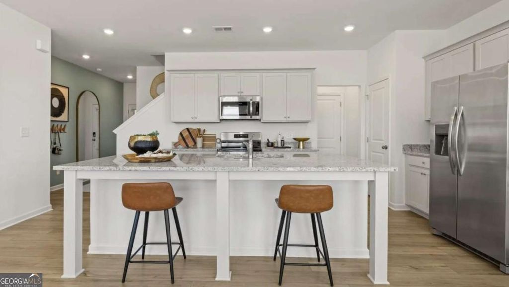 Photo of 3053 Humdala Place #143, Buford, GA 30519 (MLS # 10797145)
