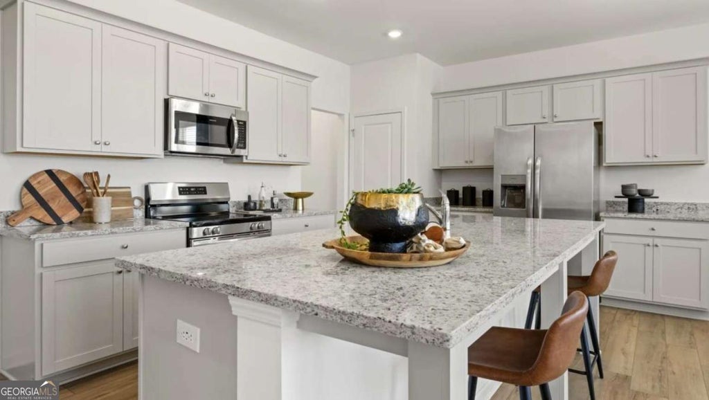 Photo of 3053 Humdala Place #143, Buford, GA 30519 (MLS # 10797145)
